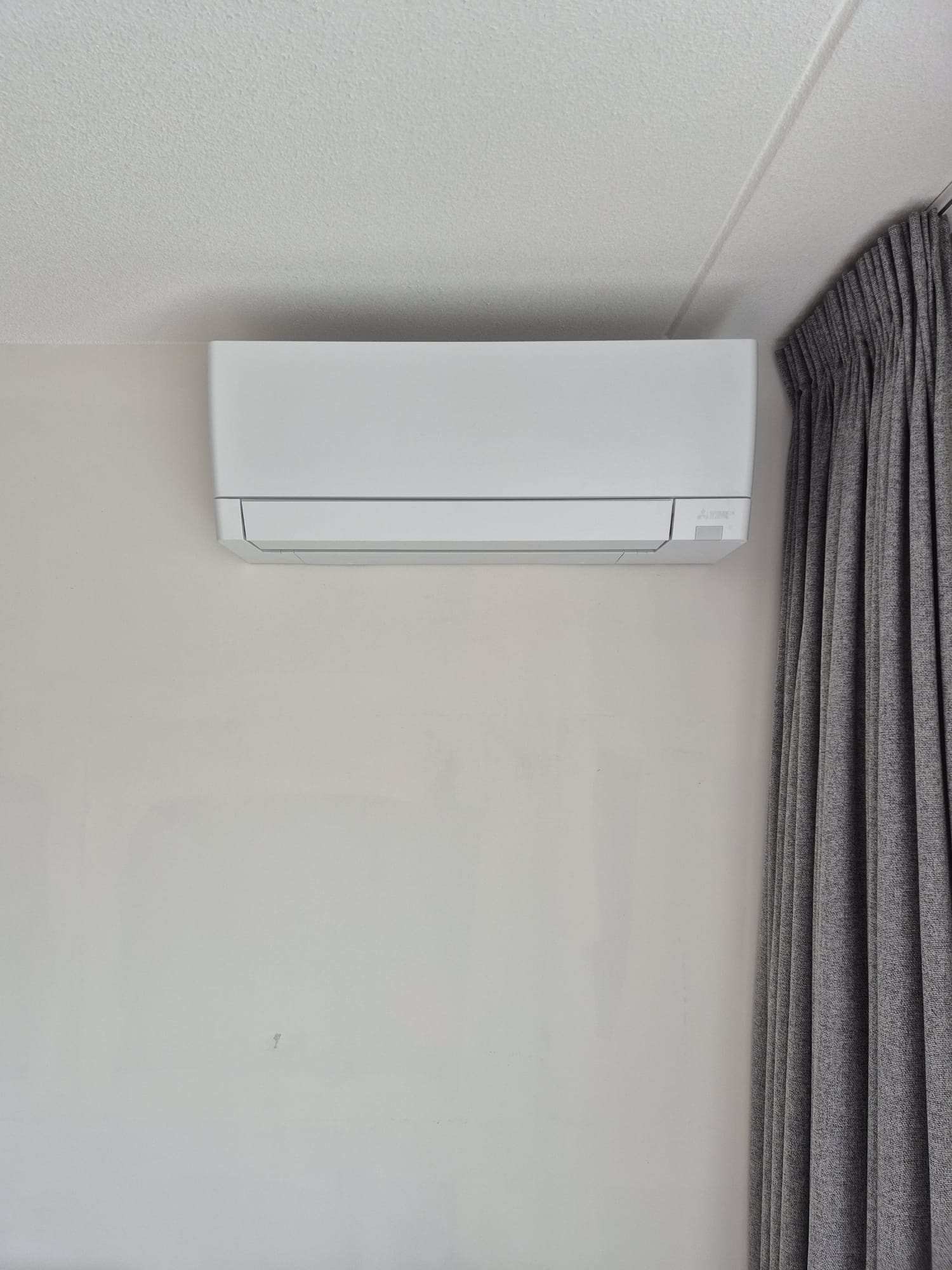 Airco in woonkamer geplaatst, foto 4
